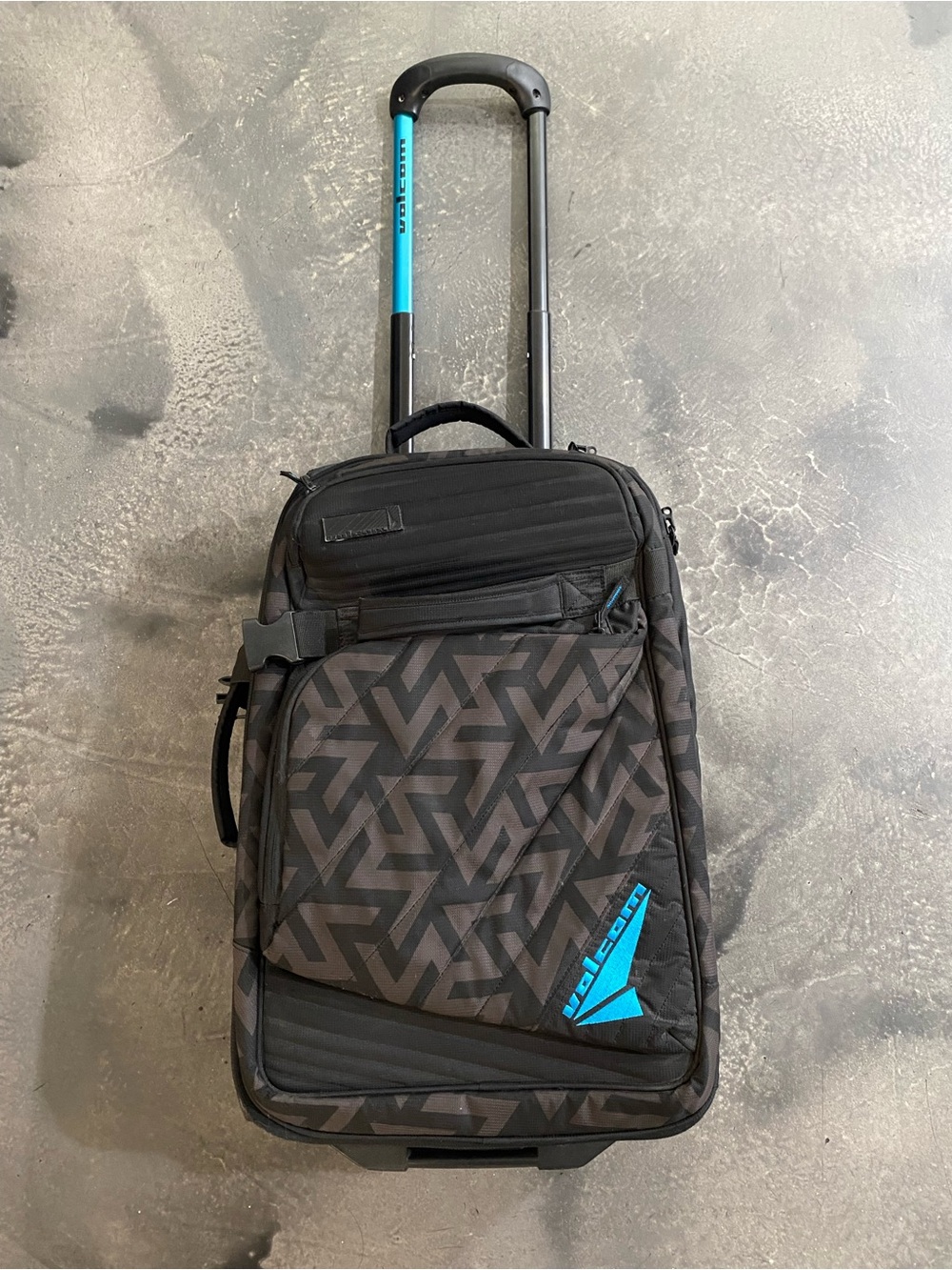 Volcom Black Carry-on Suitcase With a Geometric Grint and Electric Blue 22”x14”